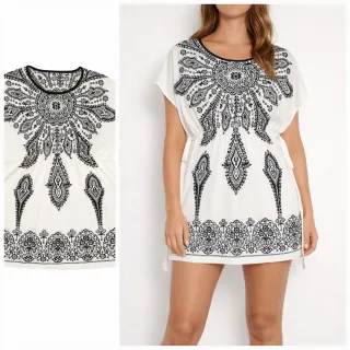 Vestido blanco estilo boho con estampado negro