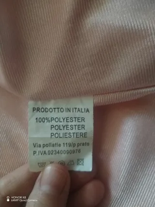 Abrigo rosa de pelo sintético con capucha