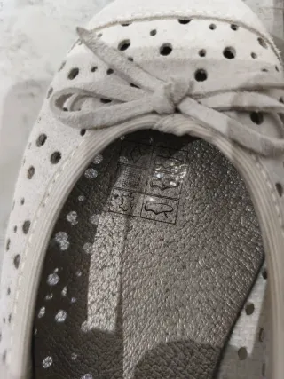 Bailarinas de piel beige y plateadas