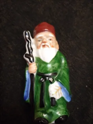 Figura Buda antiguo verde bastón