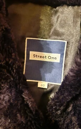 Pelliccia nera donna