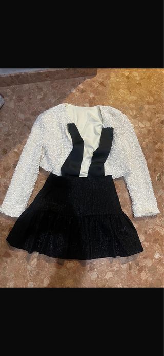 Conjunto chaqueta y falda brillante