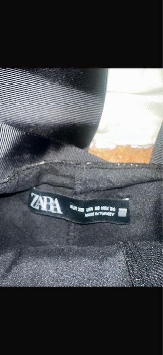 Conjunto chaqueta y falda brillante