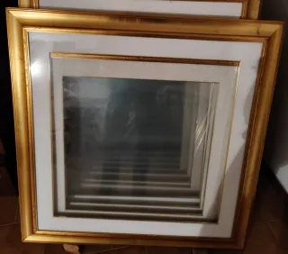 Cornice in legno oro e bianco