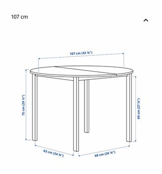 Mesa redonda blanca de madera
