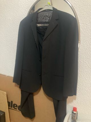 Traje de chaqueta y pantalón negro