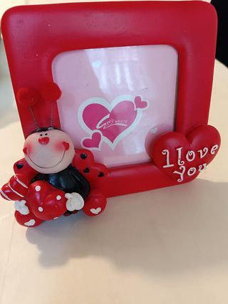 Cornice portafoto a forma di coccinella