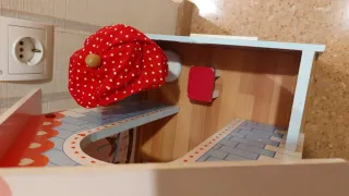 Casa de muñecas de madera