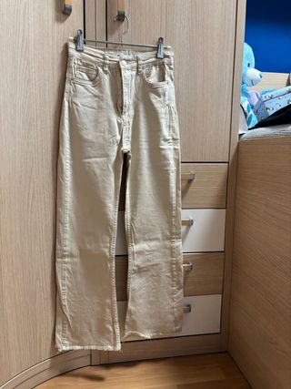 Tejano beige bajo deshilachado