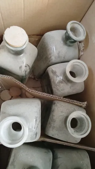 Botella de cristal con grifo