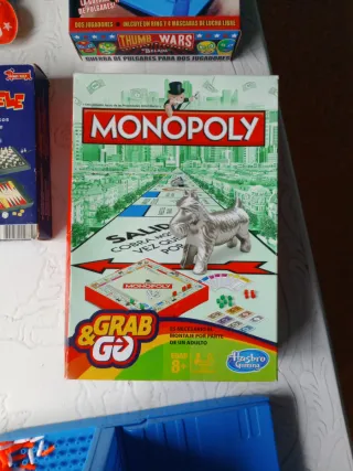 Juegos de mesa: Monopoly, Thumb Wars, Magnet-Spiel