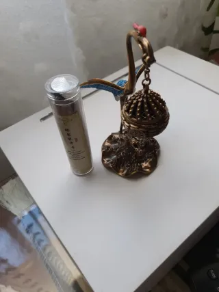 Pelícano incienso bronce azul