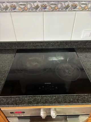 Cocina completa de madera y piedra