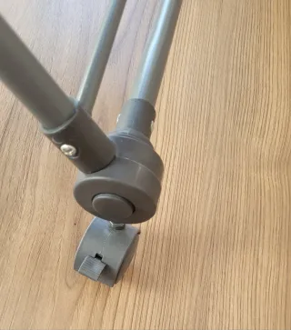 Minicuna gris con ruedas