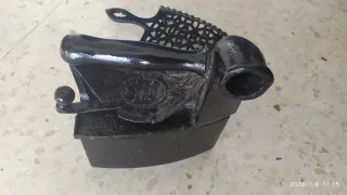 Plancha de carbón antigua