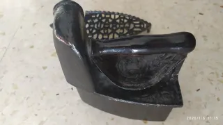 Plancha de carbón antigua