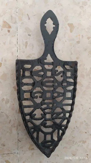 Plancha de carbón antigua