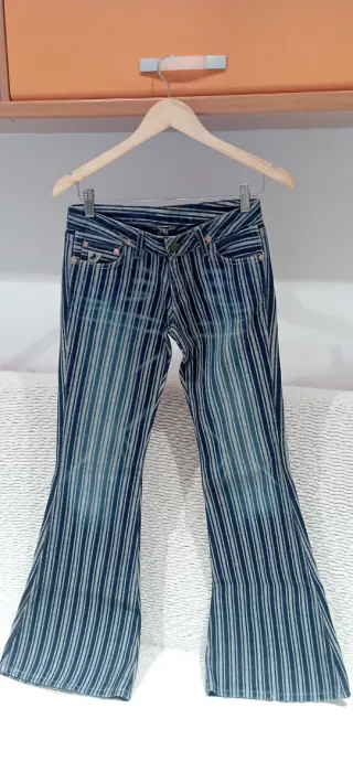 Pantalones Lois acampanados rayas azules