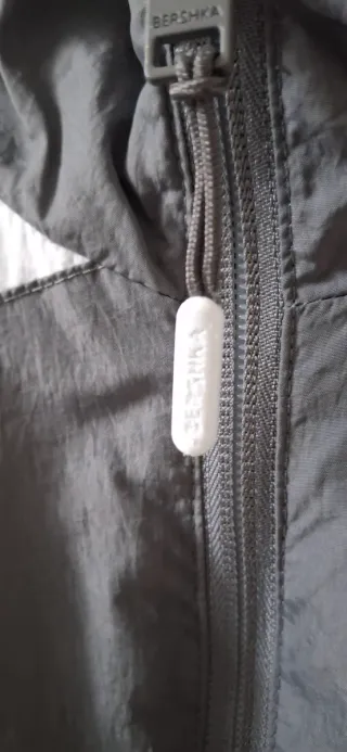 Giacca antivento uomo grigia e bianche L