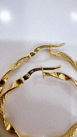 Orecchini cerchio intrecciati oro 18kt 750