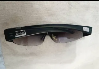 Gafas de sol Gucci negras y marrones