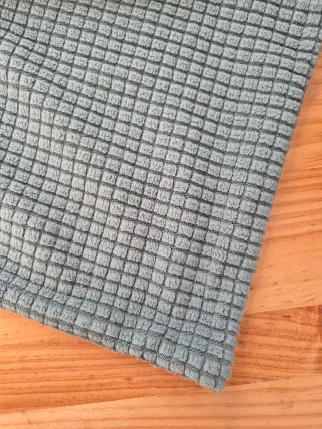 Funda de almohada verde texturizada con cremallera