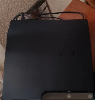 Consola PlayStation 3 Negra con dos mandos