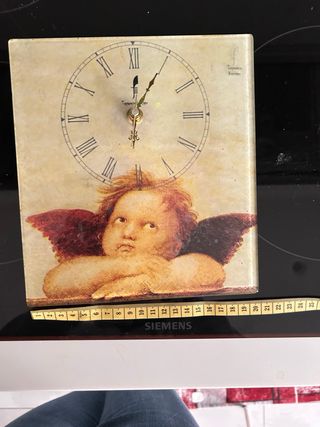 Orologio da parete con angelo