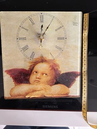 Orologio da parete con angelo