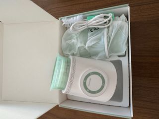 Calienta biberones Momcozy PORTABLE-MW03