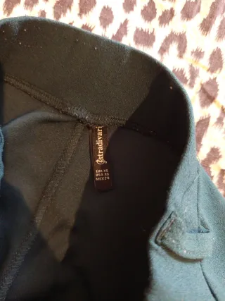 Pantaloni verdi a zampa