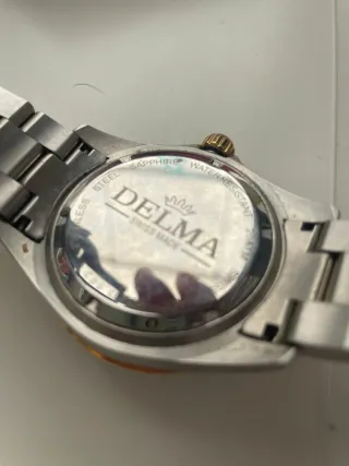 Reloj Delma bicolor oro y plata