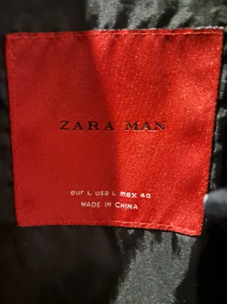 Parka Zara acolchada negra,le falta una pieza al c