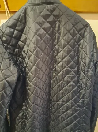 Parka Zara acolchada negra,le falta una pieza al c