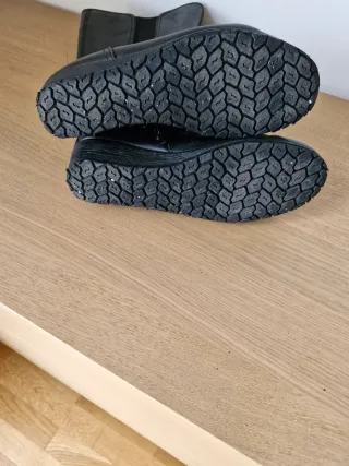 Botas altas negras de piel