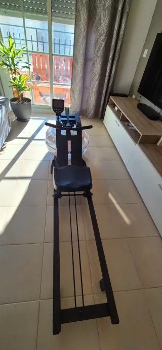 Máquina de remo con tanque de agua