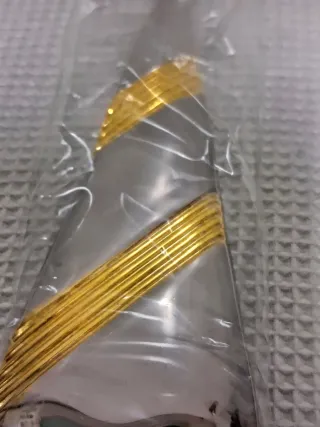 Abridor de botellas con forma de corbata