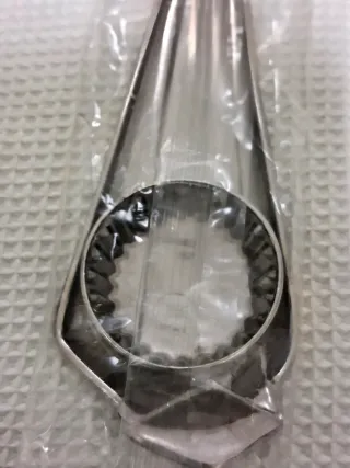 Abridor de botellas con forma de corbata