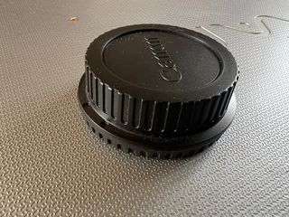 Tapa de cámara y objetivo Canon