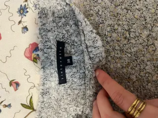 Jersey gris con brillos