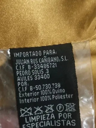 Abrigo largo de piel marrón. T.44