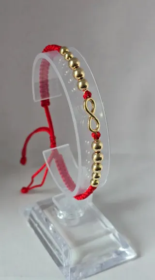 Pulsera infinito oro 18k y cordón rojo