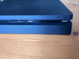 PS4 (Playstation 4)  Negra + 2 mandos