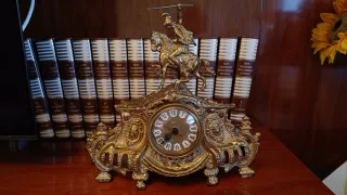 Reloj de época de bronce