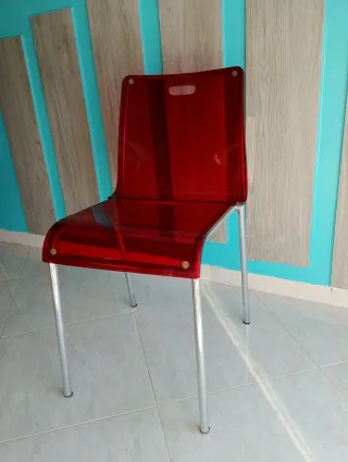 Silla Ártica rojo transparente y metal cromado