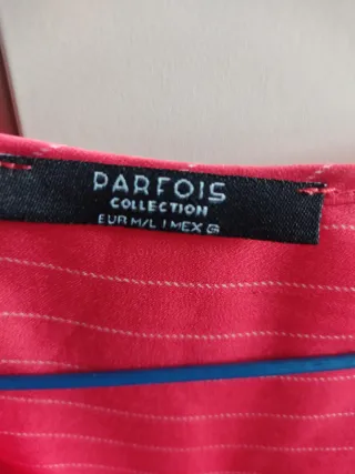 Blusa roja con rayas