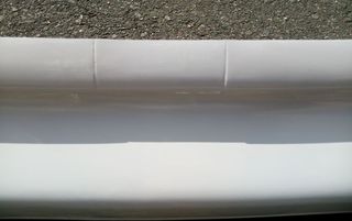 138-DEFENSA TRASERA FORD SIERRA COSWORTH