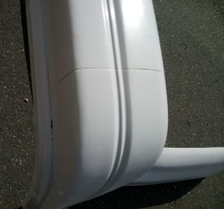 138-DEFENSA TRASERA FORD SIERRA COSWORTH