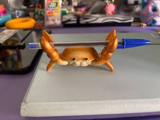 Soporte cangrejo para gafas/bolis
