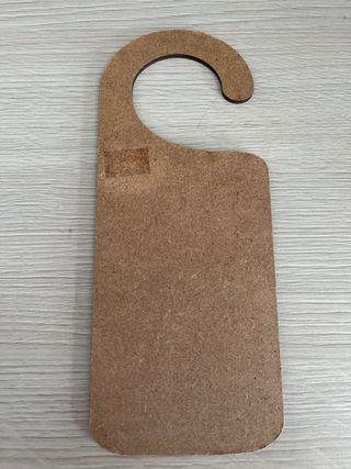 Colgador puerta Un superhéroe duerme aquí